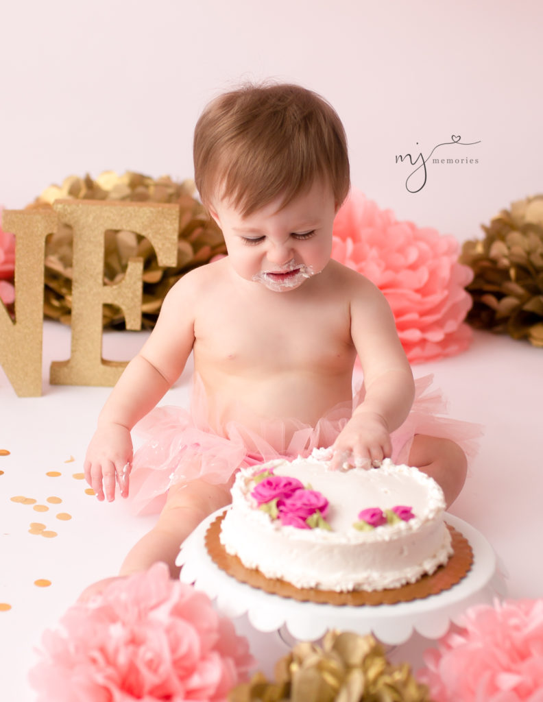 Pink and gold cake smash at our Rochester, NY studio.