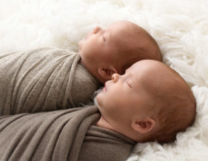 Sweet profiles of newborn twin boys at our Rochester, NY studio.