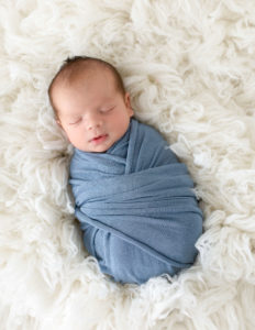 Gorgeous newborn posed in our Rochester, NY studio.