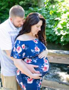 Man and woman posed at Maternity Session at Corbett's Glen Nature Park Rochester, NY.