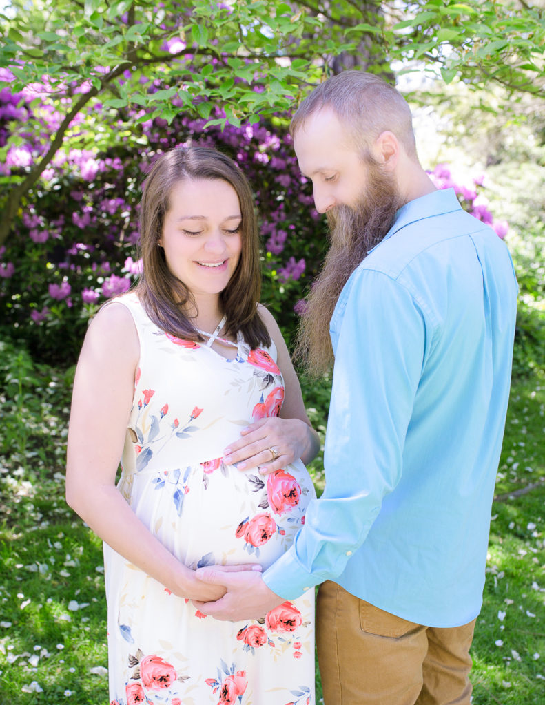 Pregnant woman posed in Rochester, Ny Highland Park.