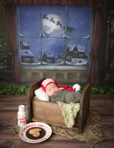 Cute newborn boy posed in our studio in Rochester, NY.