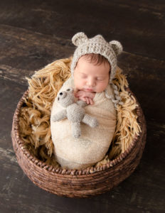 Posed adorable baby boy at our Rochester, NY studio. 