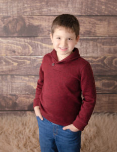 Young boy posed at our studio in Rochester, NY.