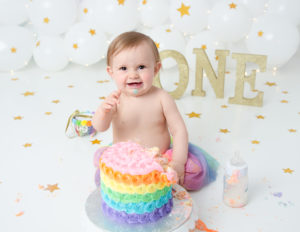 Sweet girl at her cake smash in our studio located in Rochester, NY.