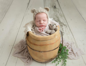 Posed newborn boy at our studio in Rochester, NY.