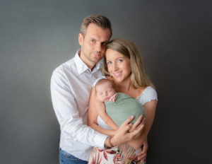 Parents posed at our studio in Rochester, NY.