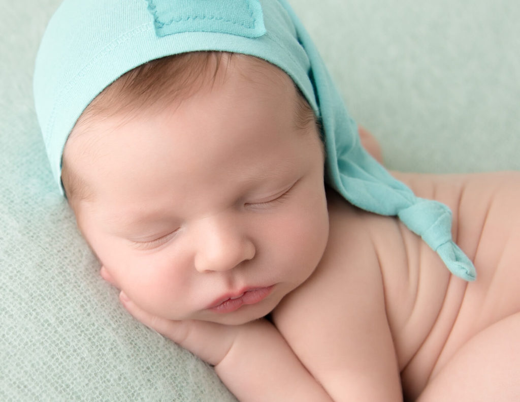 Precious newborn boy at our studio in Rochester, NY.