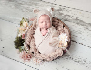 Sweet baby girl posed at our Rochester, NY studio.