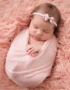 Posed newborn girl in Rochester, NY.