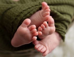 Twin baby toes in our Rochester, Ny studio.