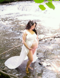 Woman posed at Maternity Session at Corbett's Glen Nature Park Rochester, NY.