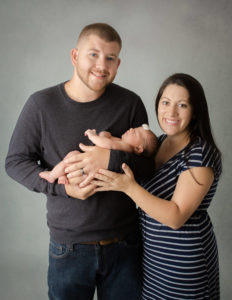Family posed at our Rochester, NY studio.