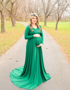 Pregnant woman posed in Rochester, Ny Basil Marella Park.
