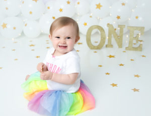 Pretty one year old girl posed at our in-home studio.