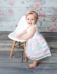 Adorable one year old posed at our in-home Rochester, Ny studio.