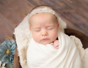 Gorgeous newborn posed in our Rochester, NY studio.