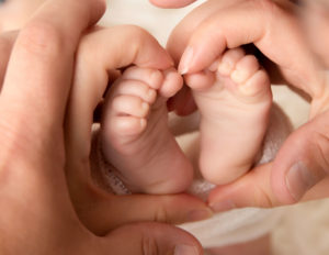 Newborn feet at our Rochester, NY studio.